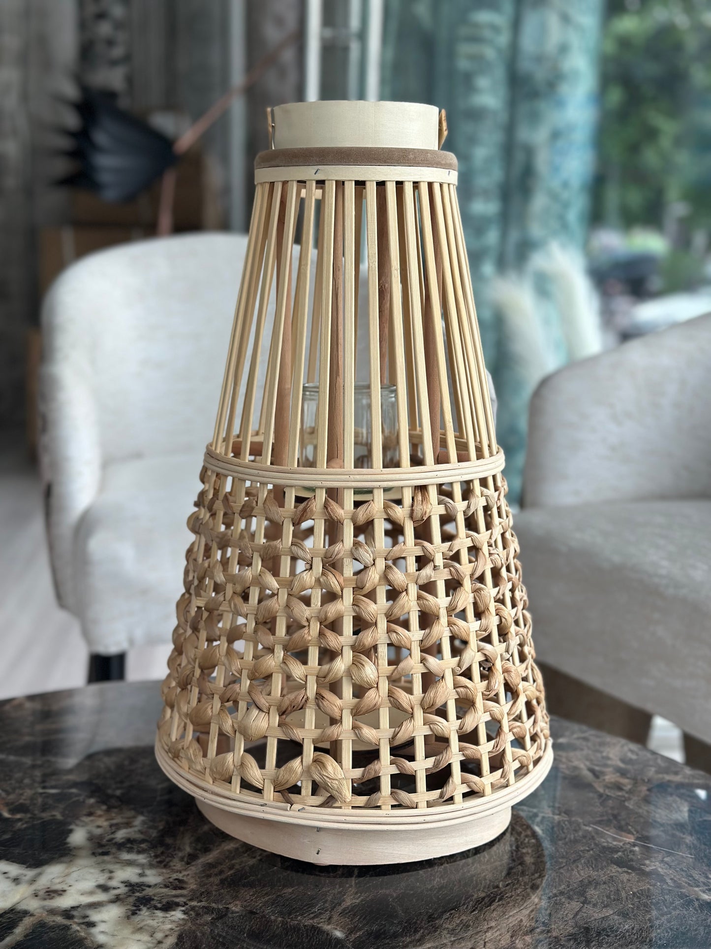Cane lantern lamp with candle
