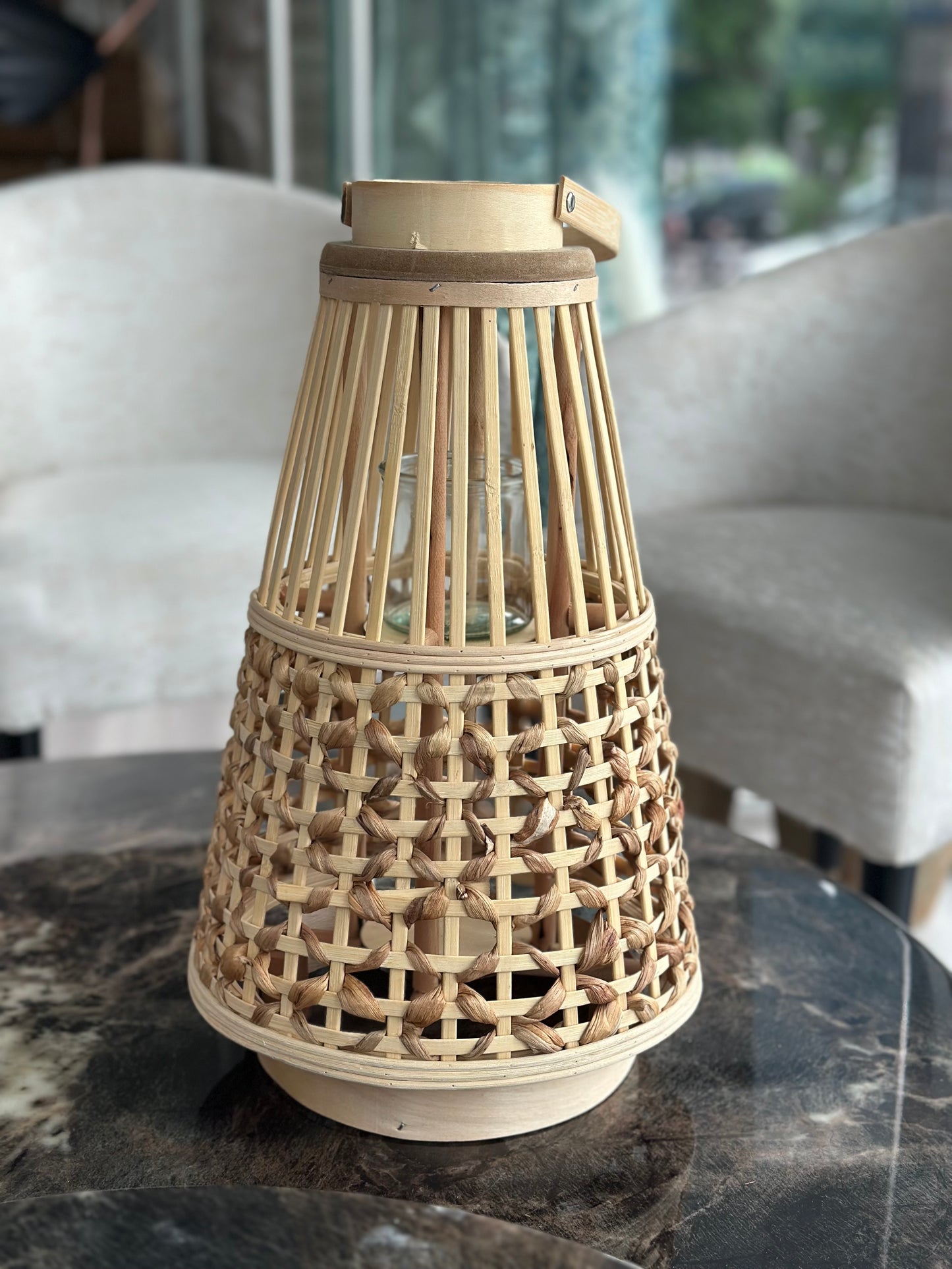 Cane lantern lamp with candle