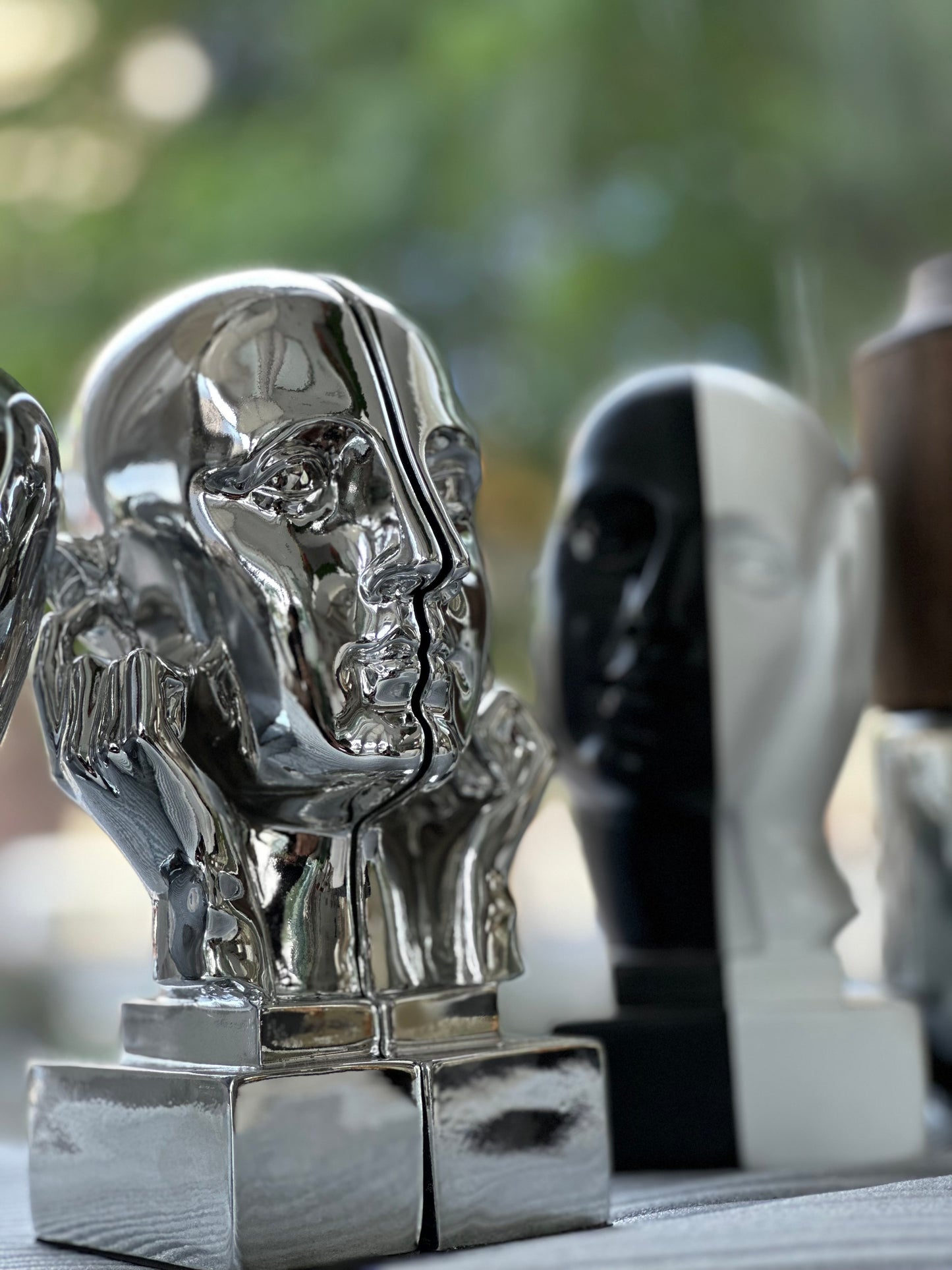 Silver sculpture book holder